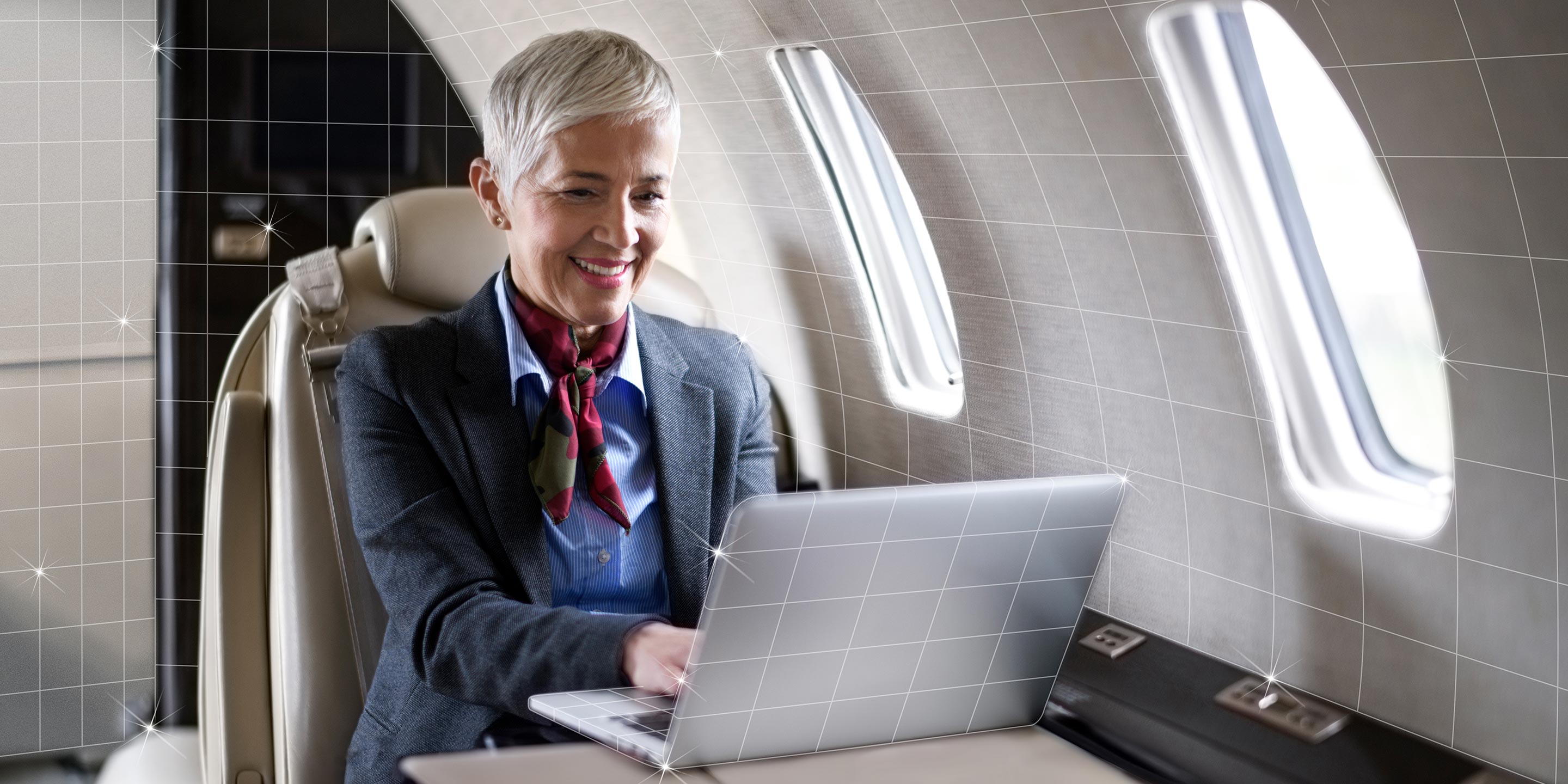 Businesswoman working on a business jet